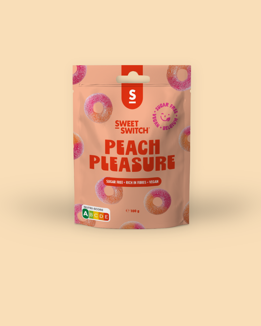 Sweet Switch Peach Pleasure snack package on a beige background sugar free